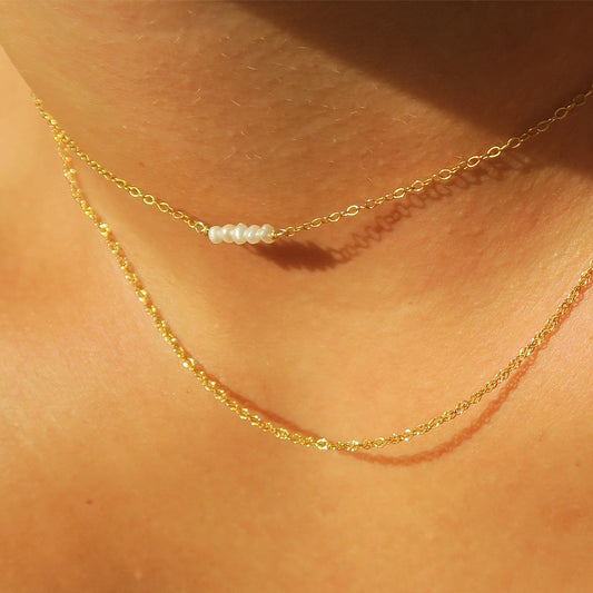 DAINTY FRESHWATER PEARL STACK NECKLACE - Yellow Gold & Silver