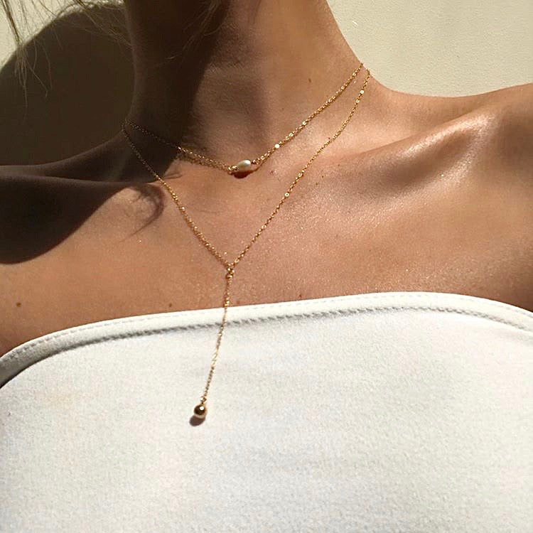 Single gold bead on sale necklace